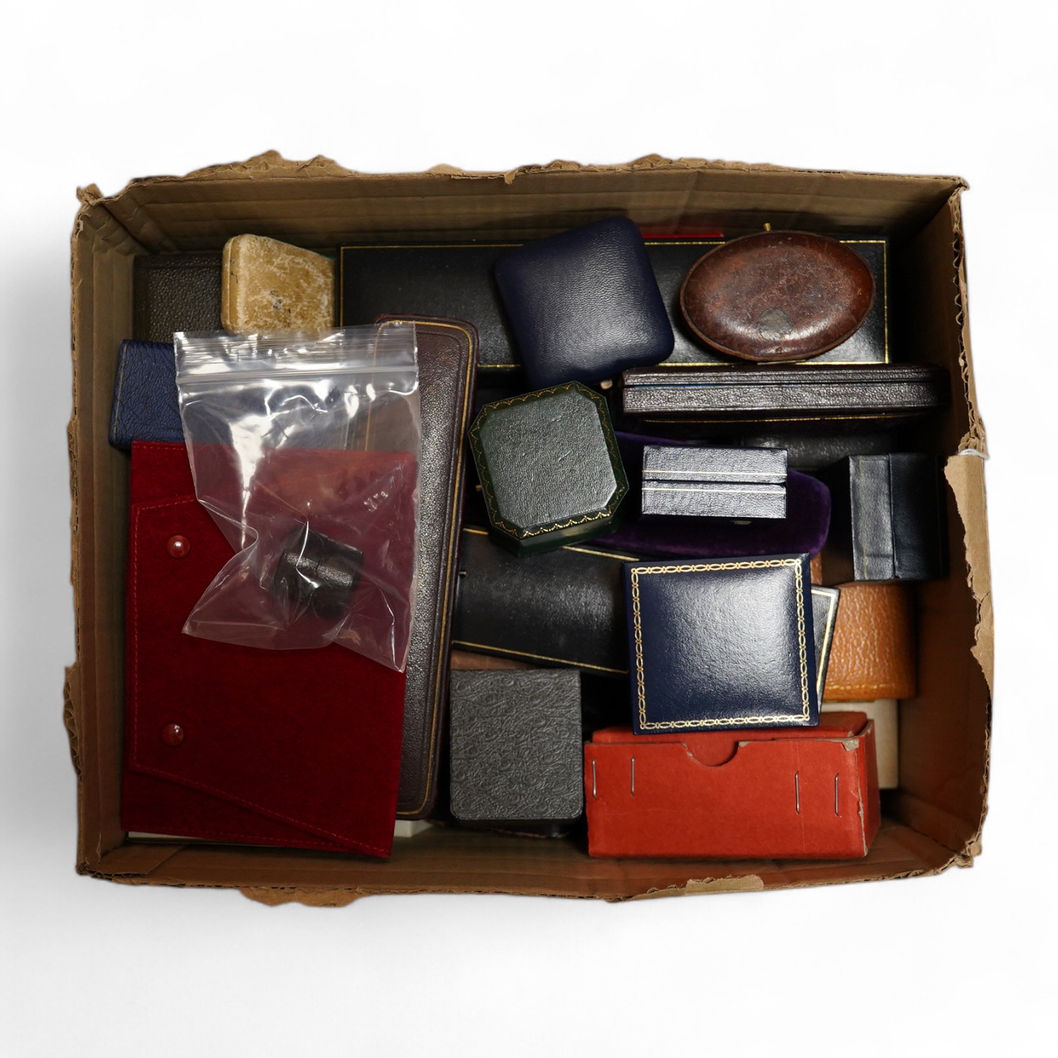 A quantity of assorted jewellery boxes including a Cartier red suede pouch. Condition - poor to fair to good.